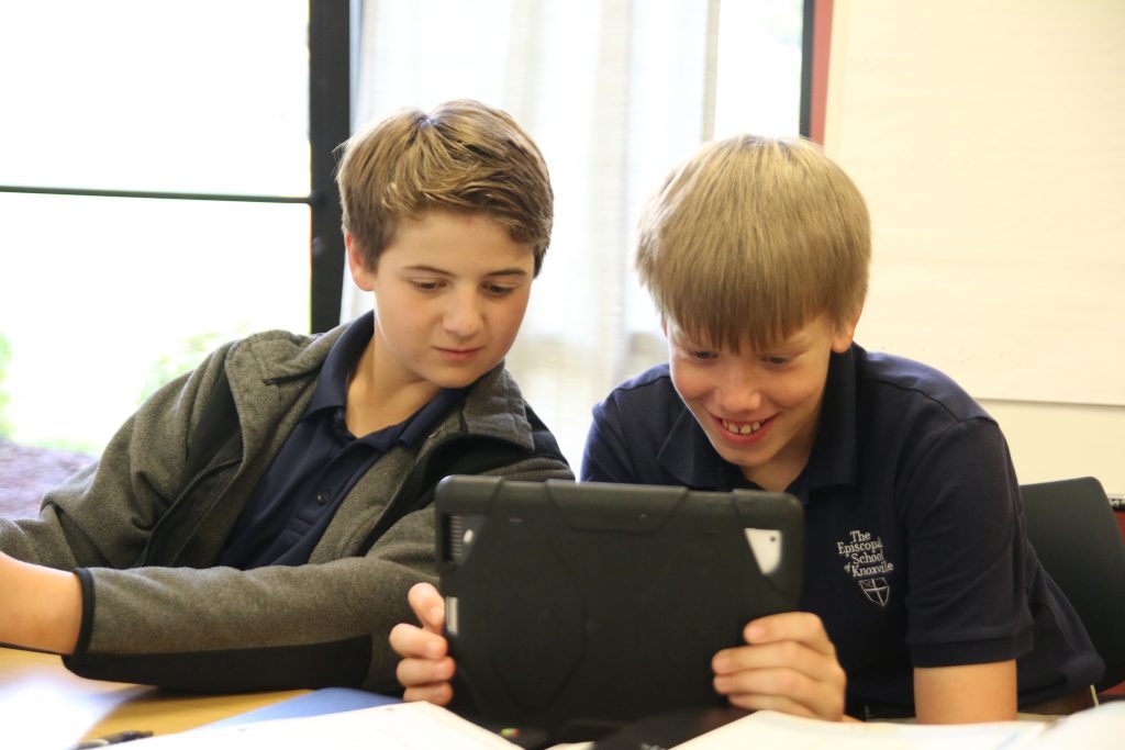 Cade and Bayless use tech skills to work on a literature project