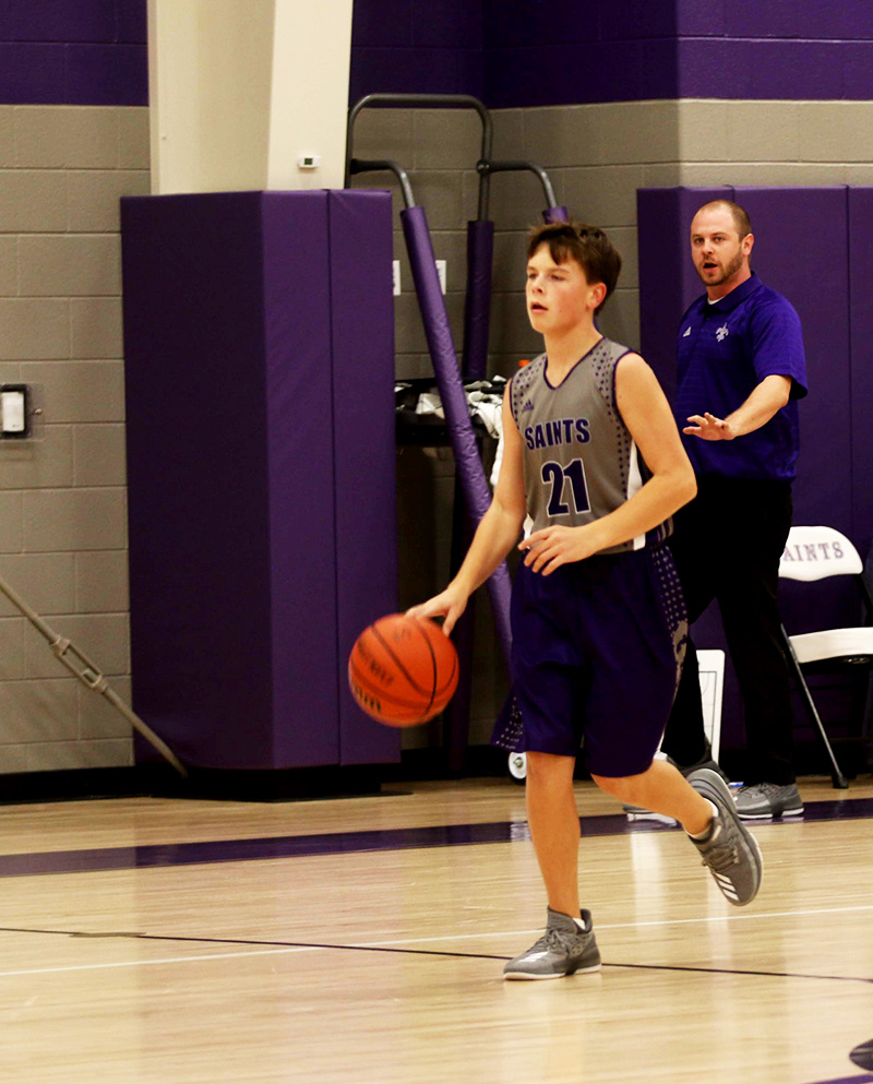 Coach Matt coaching middle school basketball