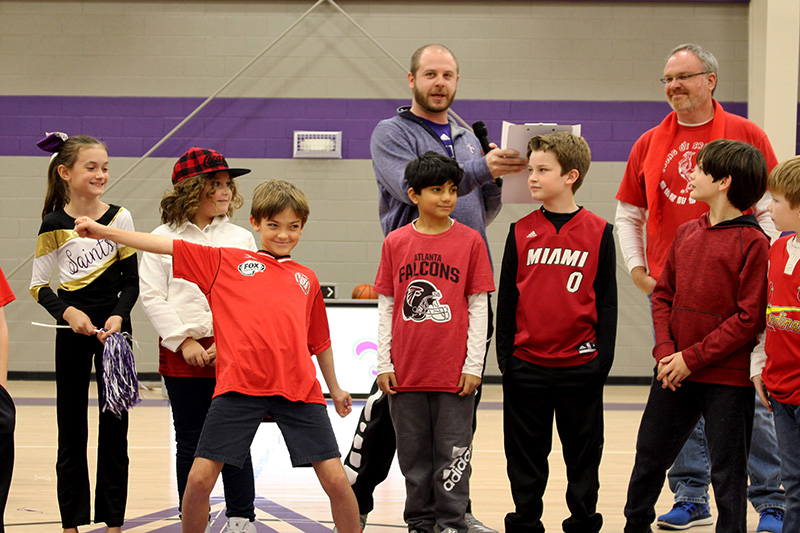 Coach Matt recognizing players at ESK athletic night